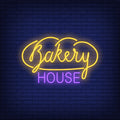 "Neon Lights Bakery House with Yellow Design"