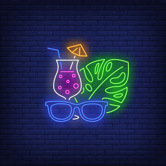 Neon Light Soft Drink Glass with Straw, Sunglasses, and Tropical Leaves